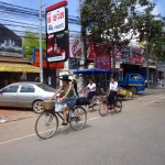 Cambodians using their most common forms of transportation
