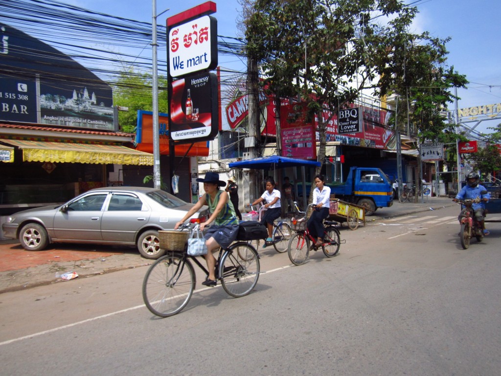 Cambodians using their most common forms of transportation
